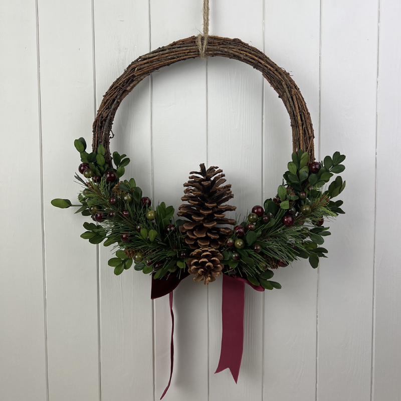Large Rattan Pinecone and Berry Wreath with Bow detail page